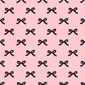 Seamless beauty bow pattern on pink background.