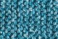 Beige Knitted Background. Blue cyan knitting wool, Netting, Knitwork. Copy space. Hobby concept