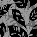 seamless black and gray pattern of tropical leaves contours, texture