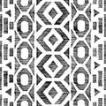 Seamless black and white pattern in doodle style. Ethnic and tribal motifs. Grunge pencil drawn by hand texture. Vertical