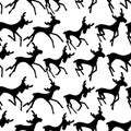 Seamless black and white pattern with running deers.