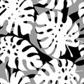 seamless black and white pattern of tropical leaves contours, texture