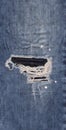 Seamless blue denim cotton jeans ripped fabric texture background Royalty Free Stock Photo