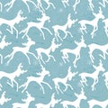 Seamless blue pattern with galloping deers.