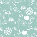 Seamless blue pattern with modest summer flowers