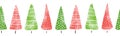 Seamless border Christmas trees hand drawn watercolor. Decorative green red hand painted repeating Winter holiday design Royalty Free Stock Photo