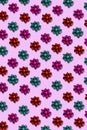 Seamless border stripe of colored packing bows on a pink background. Suitable for holiday wrapping, frames, design cards,