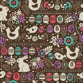 Seamless brown pattern with color easter eggs, rabbit, flowers