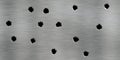 Seamless bullet holes in brushed metal background texture Royalty Free Stock Photo