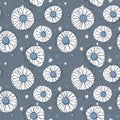 Seamless chamomile pattern on blue background