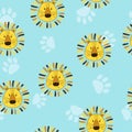 Seamless childish pattern with cute lion heads and paws.