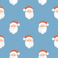 Seamless christmas pattern. Background with with santa claus head. Perfect for wrapping paper, greeting cards, textile print Royalty Free Stock Photo
