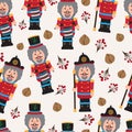 Seamless Christmas Pattern with Nutcracker, Walnuts and Berries Royalty Free Stock Photo