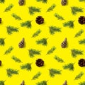 Seamless christmas pattern from Pine cones and pine twig on yellow background. modern pine cone pattern. Print for paper, fabric,