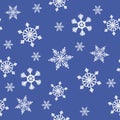Seamless Christmas pattern with snowflakes on blue background
