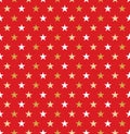 Seamless Christmas red and gold star wrapping paper pattern. Royalty Free Stock Photo