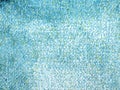 Seamless close up of monochrome blue carpet texture background from above. Royalty Free Stock Photo