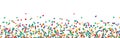 seamless colored confetti on lower border with free space for text Royalty Free Stock Photo