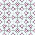 Seamless colored pattern in ethnic style. Abstract flowers with petals in green, purple and dark pink colors, white background Royalty Free Stock Photo