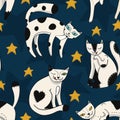 Seamless colorful pattern with funny cats with stars on dark blue sky background Royalty Free Stock Photo