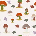 Seamless colorful mushroom and leaves vector pattern.