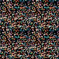 Seamless confetti pattern on black background.