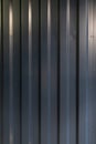 Seamless corrugated zinc sheet facade in navy blue color / architecture / seamless pattern / wallpaper concept / metal texture Royalty Free Stock Photo