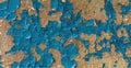 Seamless crackle texture of cracked blue enamel paint on wooden surface. Abstract grunge background. Vintage pattern from cracks,