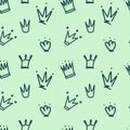 Seamless crown pattern with hand drawn doodle-style royal crowns in dark green on a light green background. Royalty Free Stock Photo