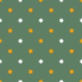 Seamless cute Halloween pattern with small orange white stars on earthy green background. Elegant holiday print for fabric textile