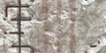 Seamless damaged concrete with rusty rebar textures. Broken stone wall with rust fittings background