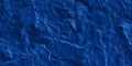 Seamless dark royal blue slate slab rock face background texture Royalty Free Stock Photo