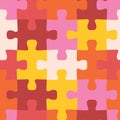 Seamless decorative vector background with puzzle pieces. Repeating background pink, red, orange, yellow. Fabric, kids wear,