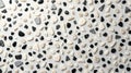 Seamless, dense macro pattern of black, white, and gray angular stone fragments creating a modern, high-contrast terrazzo or Royalty Free Stock Photo