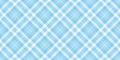 Seamless diagonal gingham plaid pattern in pastel cobalt blue and white