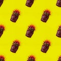 Seamless diagonal pattern with round cactus without pot. Trendy plant with sharp red needles with white roots in soil on