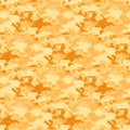 Seamless digital camouflage pattern featuring striking shades of orange and yellow in a pixelated military style texture Royalty Free Stock Photo