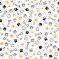 Seamless dog pattern with paw prints, bones, hearts and balls. Cat foot texture. Pattern with doggy pawprint and bones