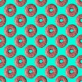 seamless donut pattern with a shadow on a turquoise background Royalty Free Stock Photo