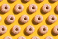 Seamless Doughnut Pattern on bright illuminating background Royalty Free Stock Photo