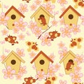 Seamless Easter background with birdhouses, birds and flowering branches Royalty Free Stock Photo