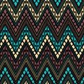 Seamless ethnic pattern. Horizontal lines in the form of a zigzag. Beige, blue, brown and black colors. Royalty Free Stock Photo