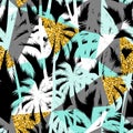 Seamless exotic pattern with palm leaf silhouettes. Gold glitter texture. Royalty Free Stock Photo