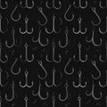 Seamless Fishing Hook Pattern on Dark Background Royalty Free Stock Photo
