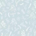 Seamless floral Christmas pattern with white tree branches, fir cones, berries, leaves on blue background Royalty Free Stock Photo