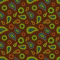 Seamless floral colored pattern with green, blue, brown and orange plants, flowers and leaves on brown or black background. Ethnic