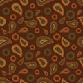 Seamless floral pattern with beige and brown plants, flowers and leaves on brown background. Ethnic oriental print with cucumbers.