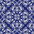 Seamless floral pattern of curls. Blue and white background. Geometric swirl ornament. Graphic modern pattern Royalty Free Stock Photo