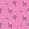 Seamless floral pattern, cute ditsy print with small flowers, simple tiny bouquets on pink. Vector. Royalty Free Stock Photo
