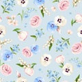 Seamless floral pattern with pink, white, and blue flowers on a blue background. Vector illustration Royalty Free Stock Photo